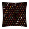 Patterned fabric with colorful geometric design on a brown background