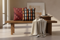 Two patterned pillows on a white background