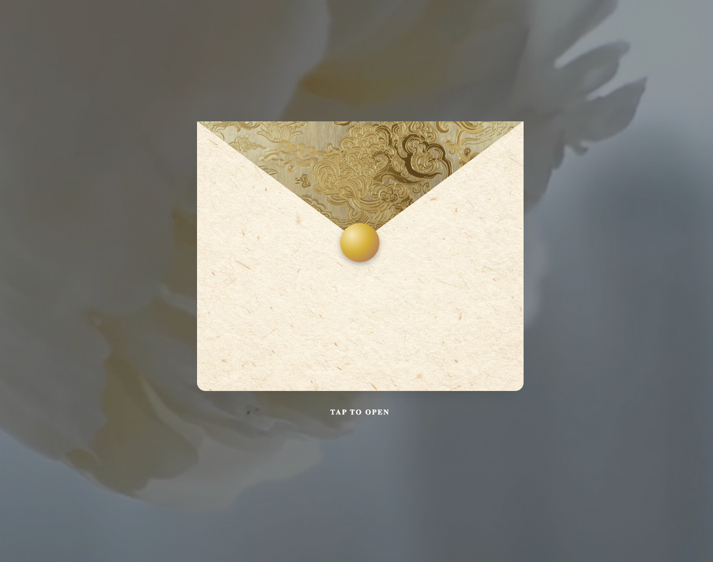 Decorative envelope with a gold button on a gray background