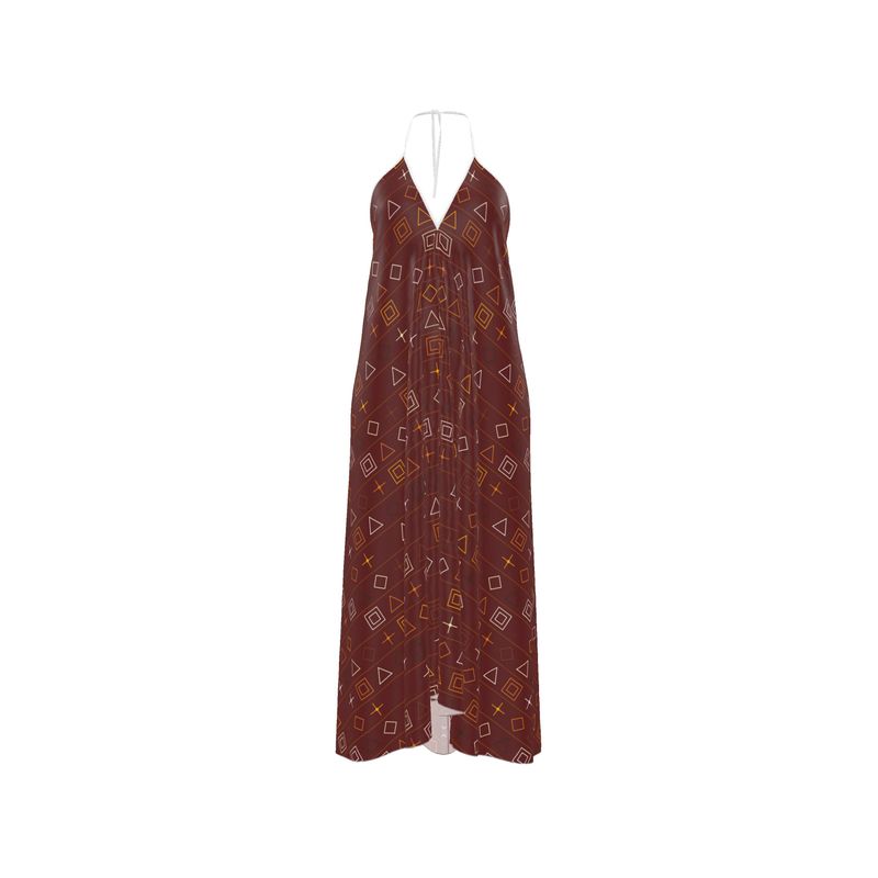 Two long, patterned dresses hanging on a rack against a white background