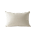 Beige pillow on a white background