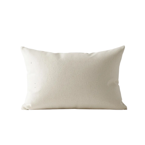 Beige pillow on a white background